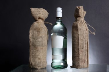 Bag for water or alcohol with bottle clipart