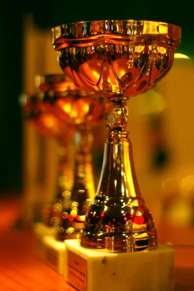 Many shiny gold trophies — Stock Photo, Image