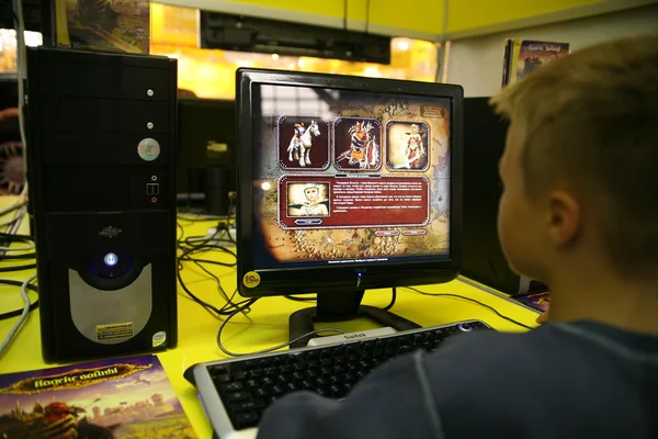 Hands of boys playing video games — Stock Photo, Image