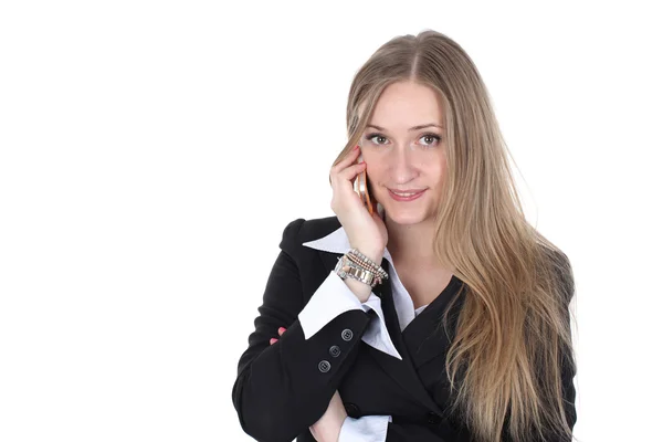 Mujer en traje de negocios hablando con móvil aislado en blanco — Stockfoto