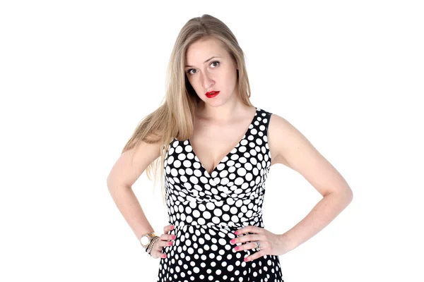 Yong vrouw in klassieke retro polka dot jurk geïsoleerd op wit — Stockfoto