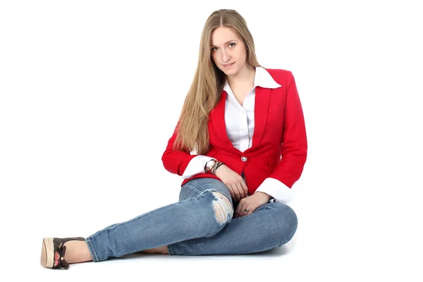 Casual woman in red coat smiling — Stock Photo, Image