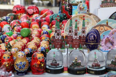 Very large selection of matryoshkas Russian souvenirs at the gift shop clipart
