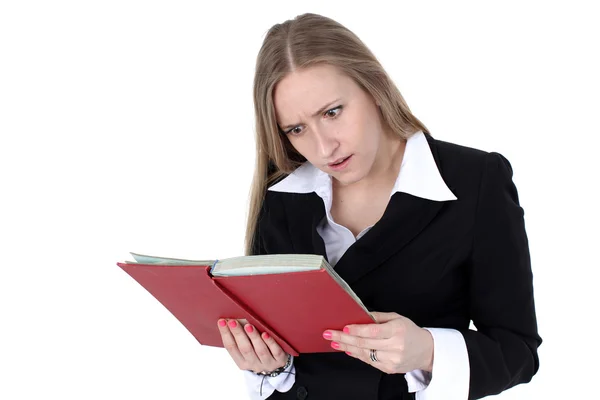 Business woman reading bok — Stockfoto