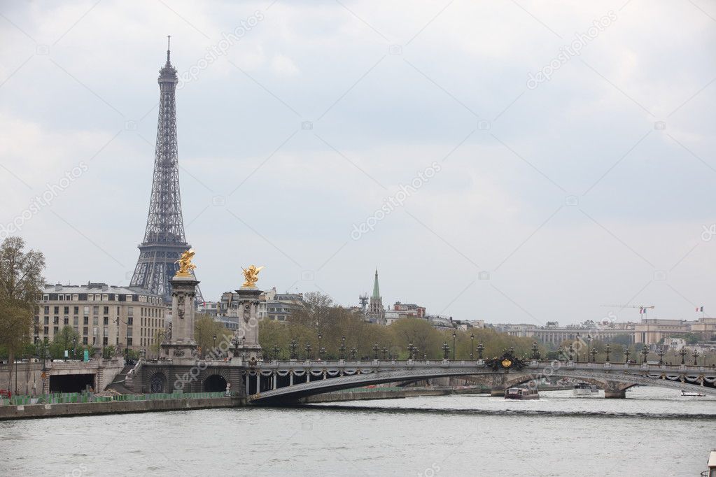 Beautiful cityscape with the Eiffel Tower, river Seine and The Alexander III Bridge