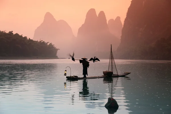 Homem chinês pesca — Fotografia de Stock