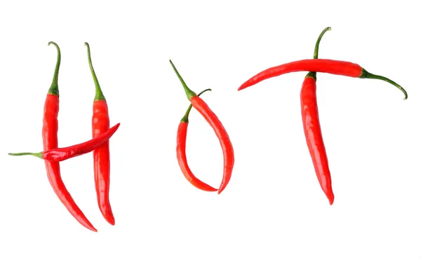 Hot written with peppers isolated over white — Stock Photo, Image