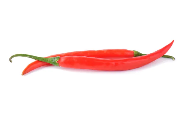 Dos chiles rojos sobre un blanco — Foto de Stock