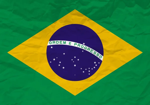 Brazil flag crumpled paper — Stock Vector