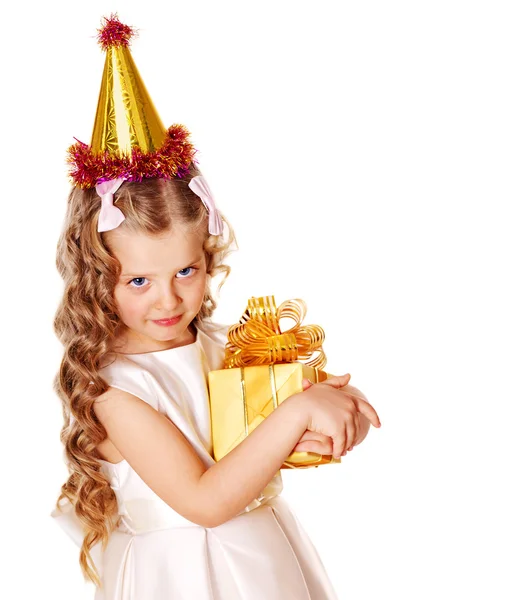 Child in party hat with gold gift box . — 스톡 사진