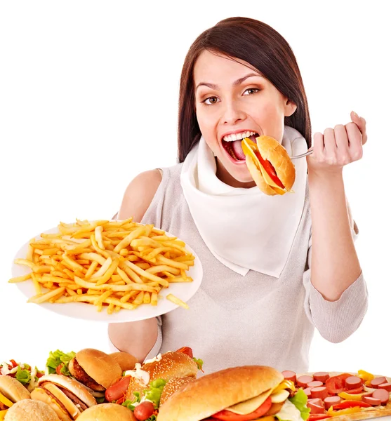 Mujer comiendo comida rápida. —  Fotos de Stock