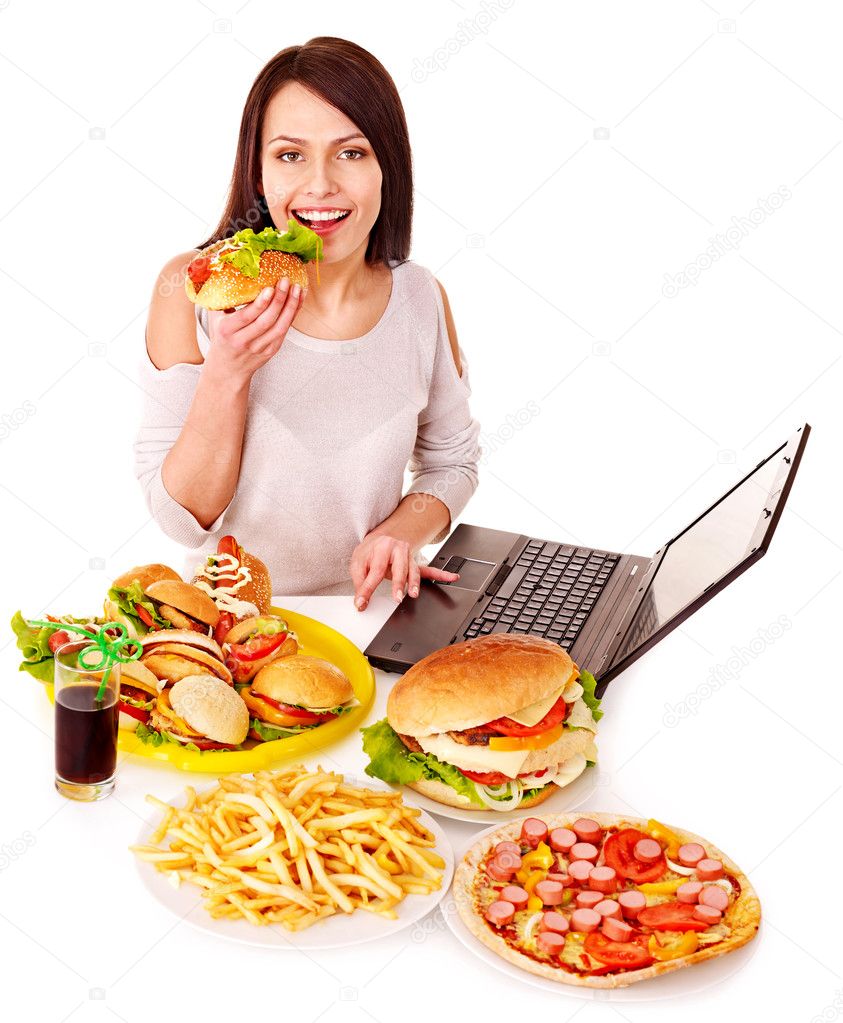 Woman eating junk food.
