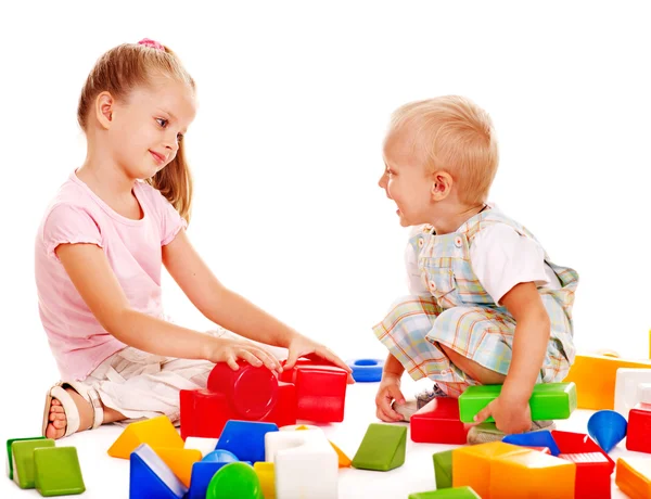 Children play building blocks. — Stock Photo, Image