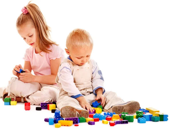 Children play building blocks. — Stock Photo, Image