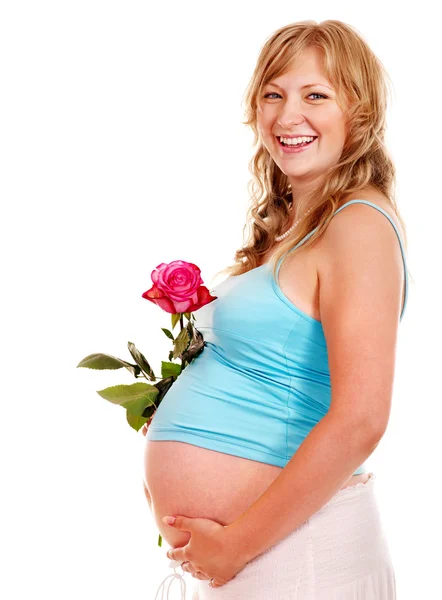 Pregnant woman with flower. Stock Image