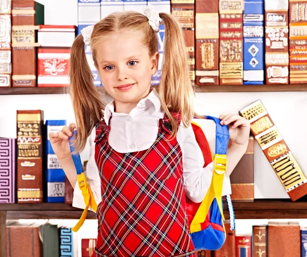 Niño con libro de pila . — Foto de Stock