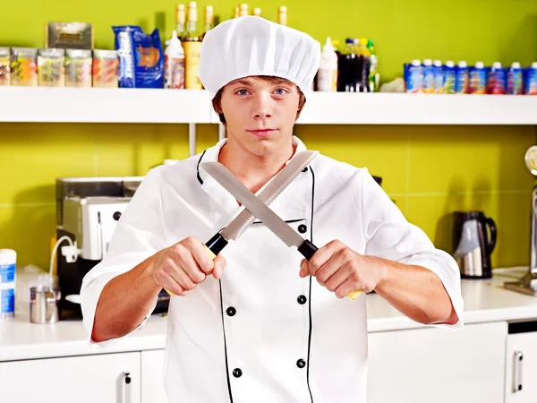 Male wearing chef uniform.