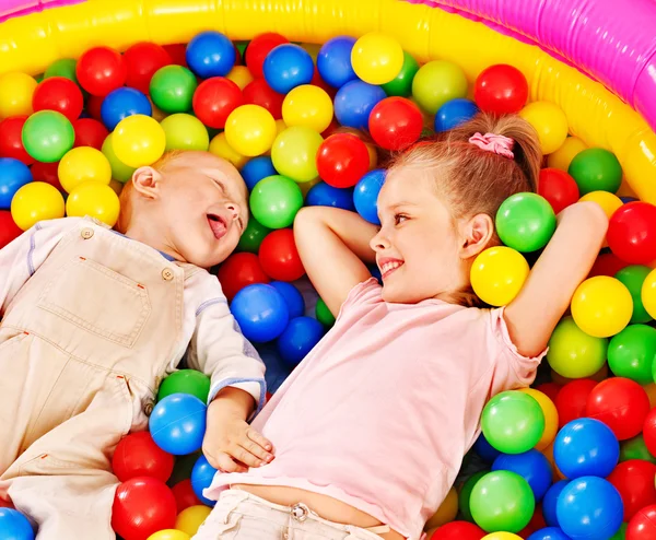 Kids in colored ball. — Stock Photo, Image