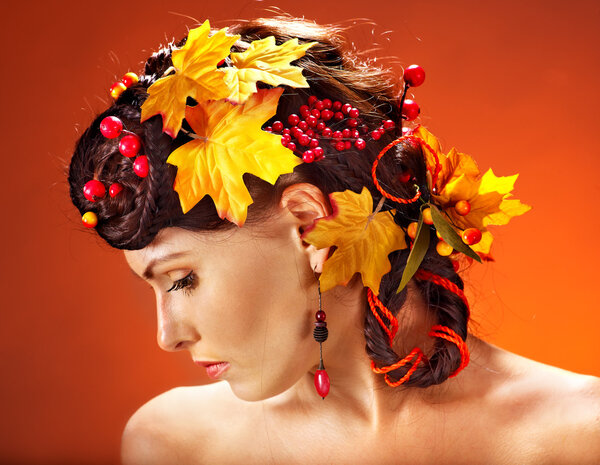 Girl with autumn hairstyle and make up.