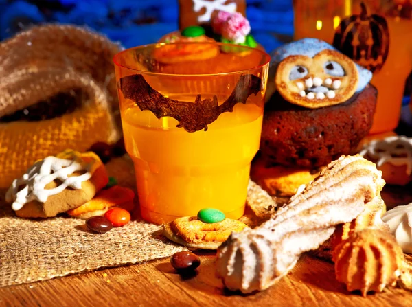 Halloween table with trick or treat — Stock Photo, Image