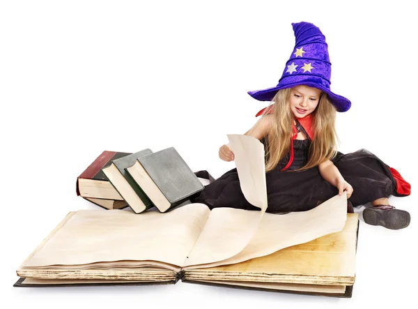 Bruxa menina segurando livro . — Fotografia de Stock