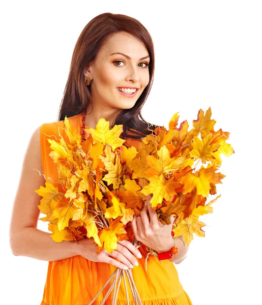 Woman holding orange leaves. — Stock Photo, Image