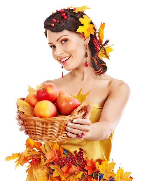 Girl holding basket with fruit. — Stock Photo, Image