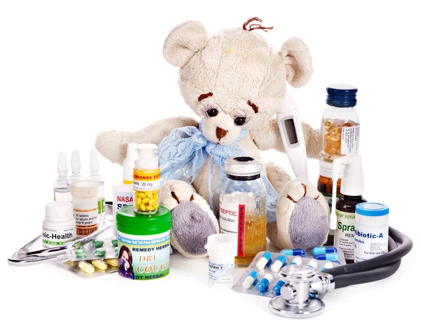 Child medicine and teddy bear. — Stock Photo, Image
