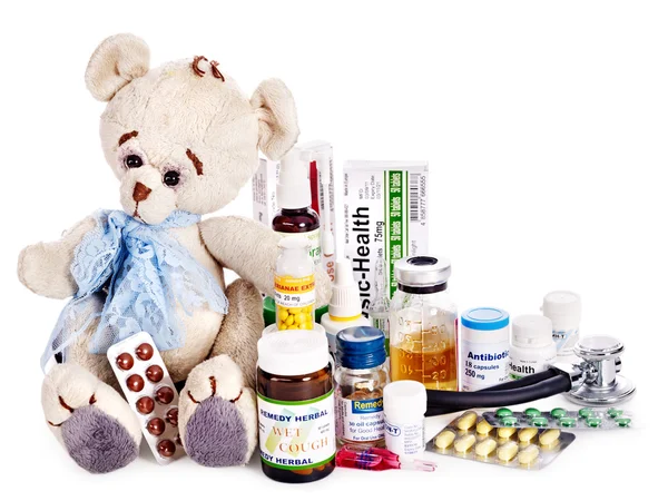 Child medicine and teddy bear. Isolated. — Stock Photo, Image