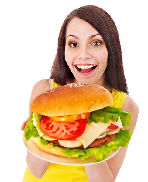 Frau hält Hamburger. — Stockfoto