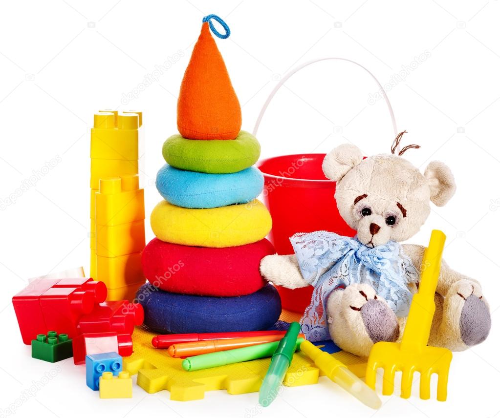 Children toys with teddy bear.