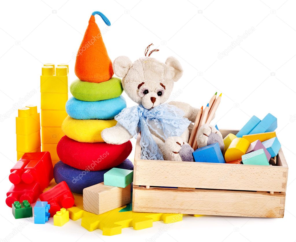 Children toys with teddy bear and cubes.