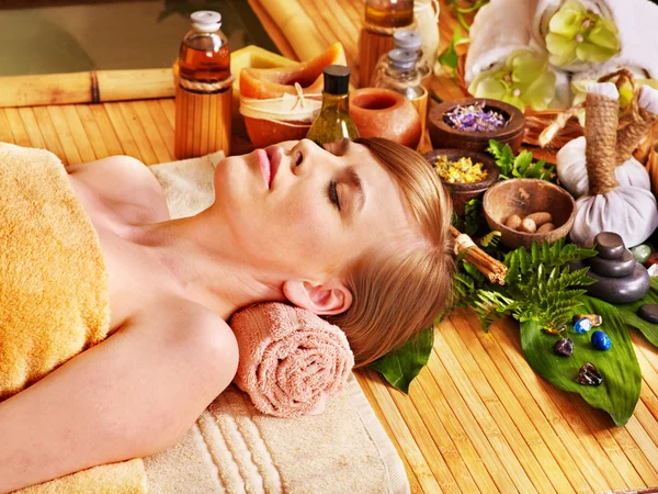 Woman getting massage in bamboo spa. — Stock Photo, Image