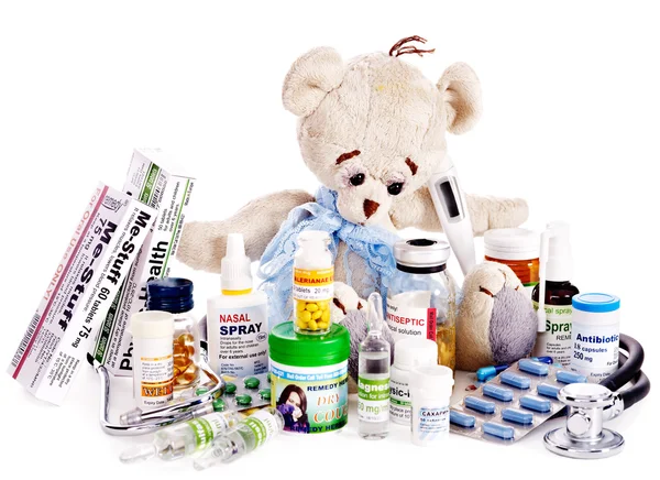 Child medicine and teddy bear. — Stock Photo, Image