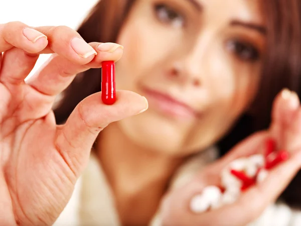 Young woman having flu takes pills. — Stock Photo, Image