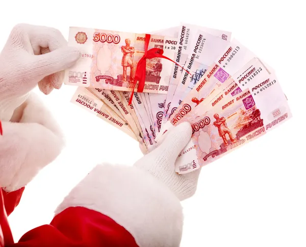 Santa Claus hand with money Russian rouble. — Stock Photo, Image