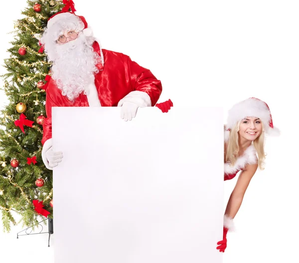 Santa claus en Kerstmis meisje bedrijf banner. — Stockfoto