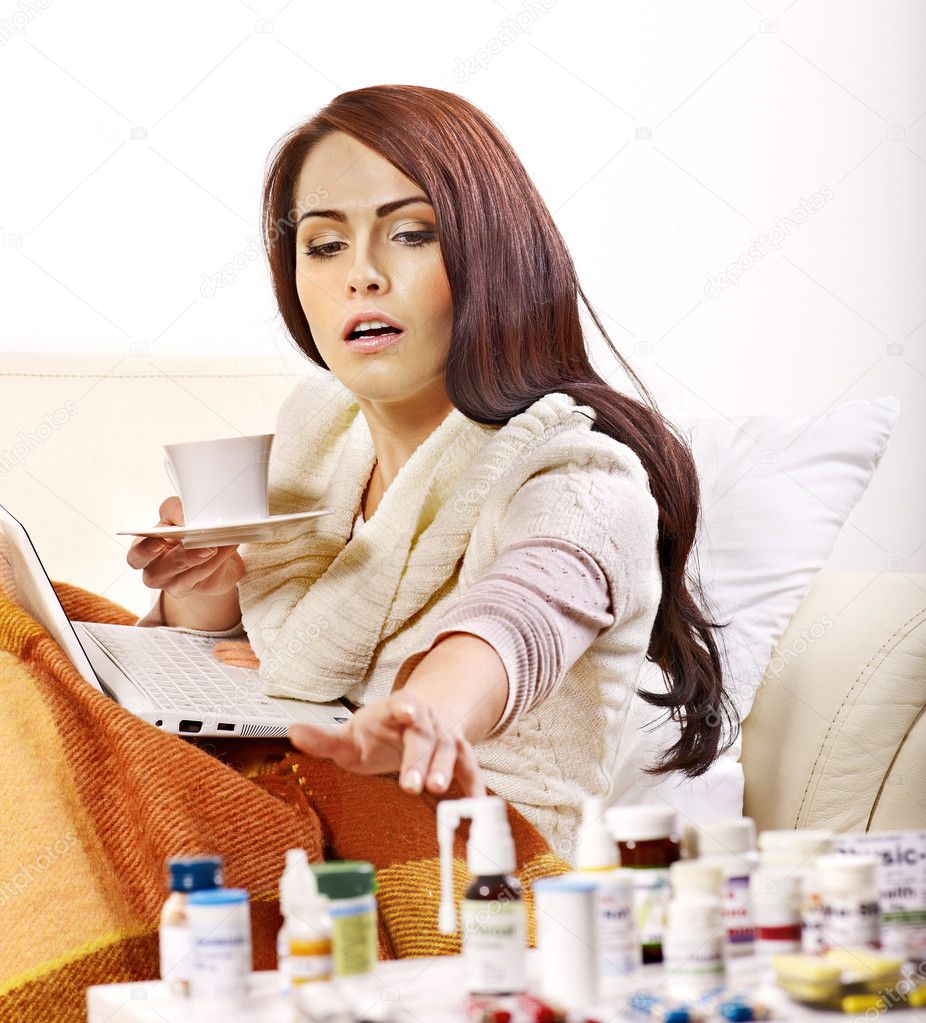 Woman having pills and tablets.