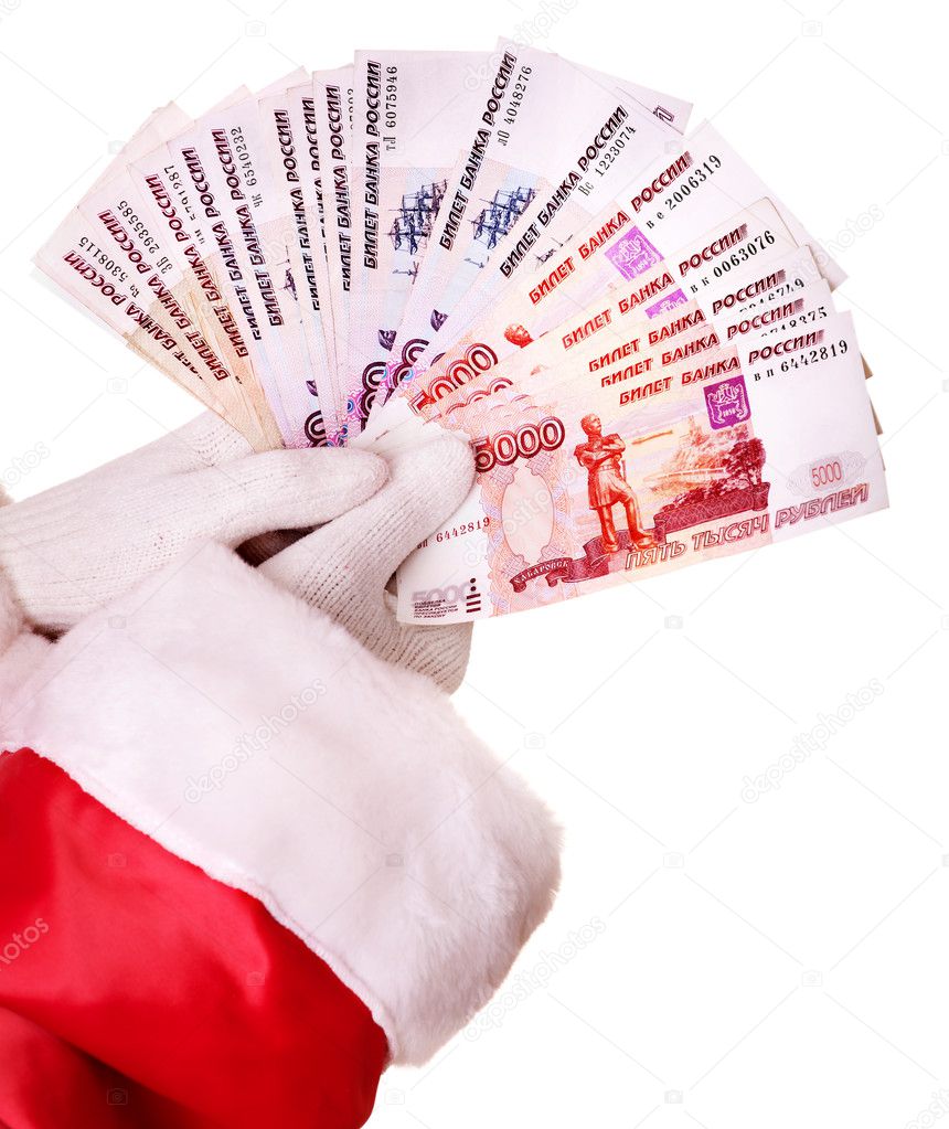 Santa Claus hand with money Russian rouble.