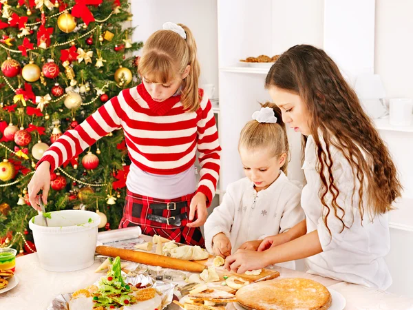 Children rolling dough in kitchen. — Stock Photo, Image