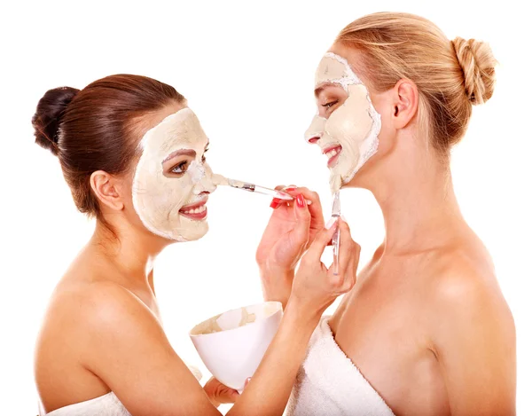 Woman getting facial mask. — Stock Photo, Image