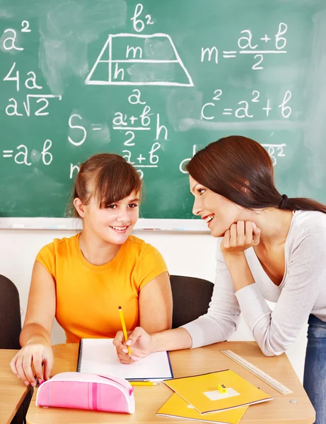 Criança escolar com professor . — Fotografia de Stock