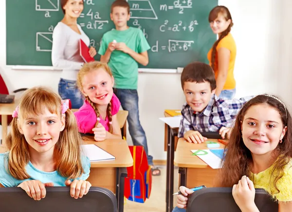 Niño de escuela con maestro . — Foto de Stock