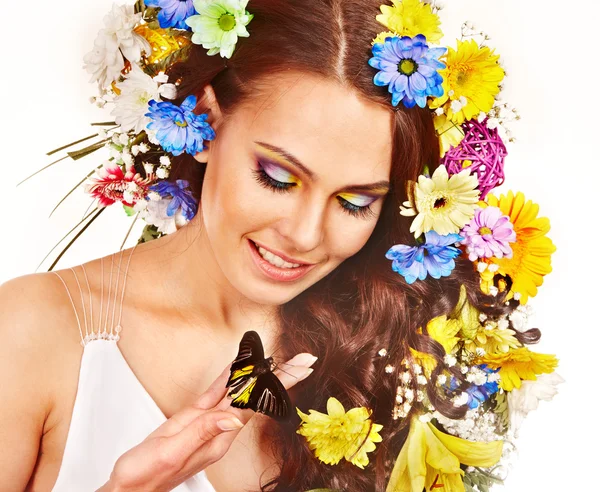 Frau mit Blume und Schmetterling. — Stockfoto