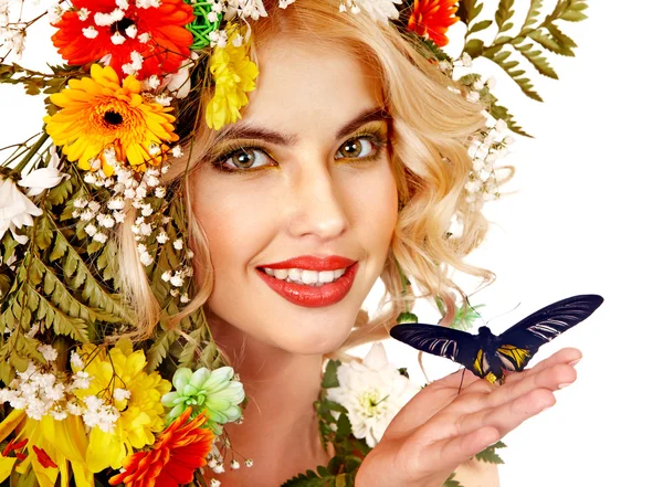 Frau mit Blume und Schmetterling. — Stockfoto