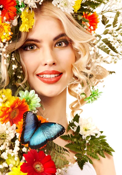 Frau mit Blume und Schmetterling. — Stockfoto