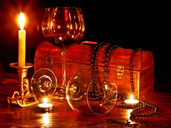 Two wine glass and candle on dark — Stock Photo, Image