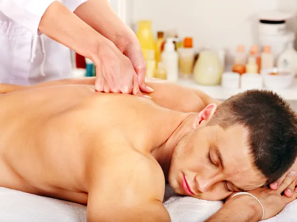 Man getting massage in spa. Stock Image