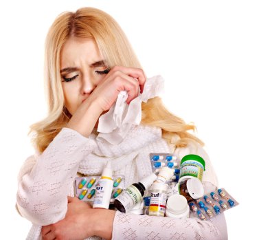 Woman with handkerchief having cold.