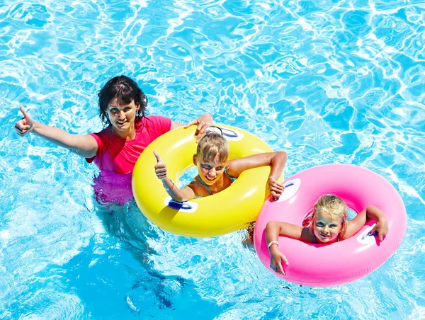Family in swimming pool. — Stock Photo, Image